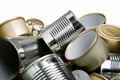 Low-carbon vans of a skip hire fleet ready for collection